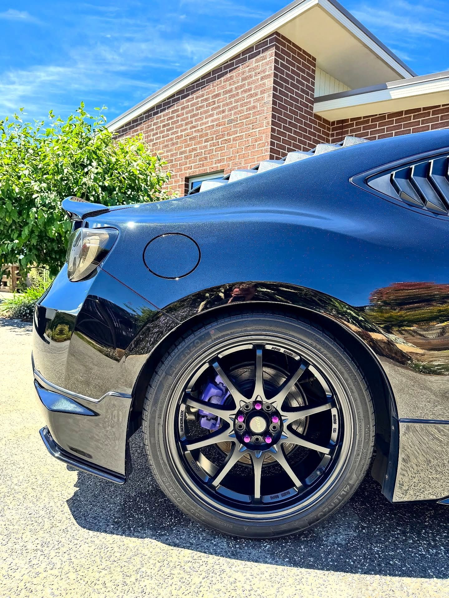 A deep blue performance car detailed to a high gloss by The Driveway Detailer in Adelaide